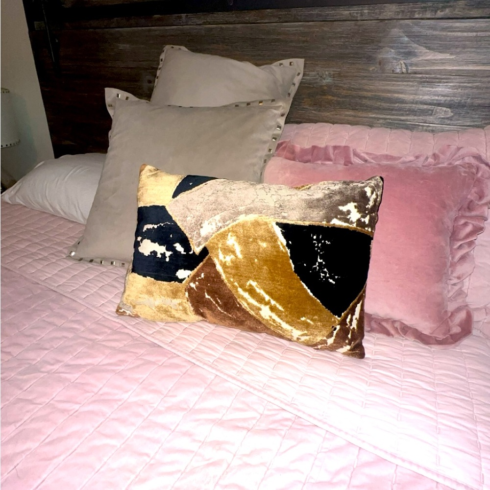 Velvet pillow print with black tans and browns